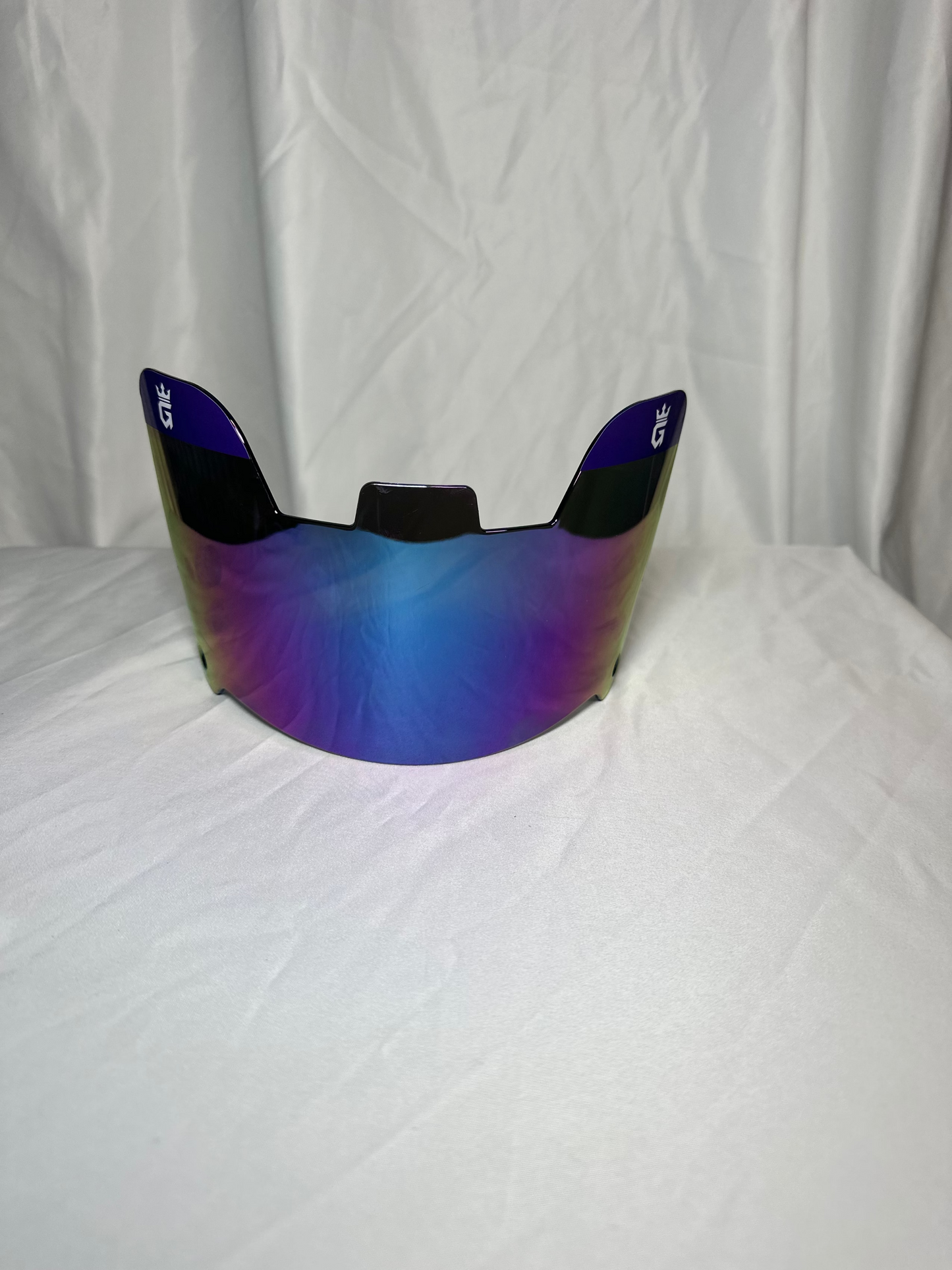 Blue and purple reflective visor on a white background